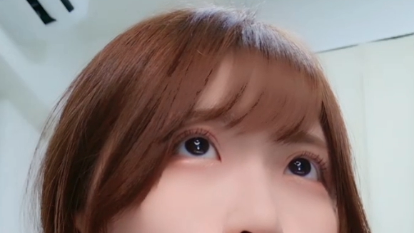 Sayuringo_ Japanese cam girl on Stripchat with cute pout expression in a cozy bedroom setting